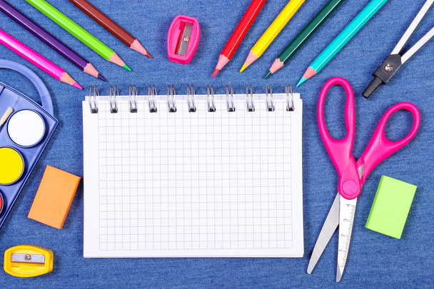 School and office supplies on jeans background, back to school concept, copy space for text - Φωτογραφία, εικόνα