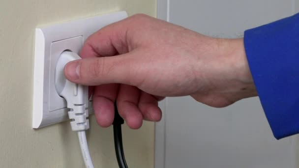 Hand Put Plug Into Electricity Socket - Footage, Video