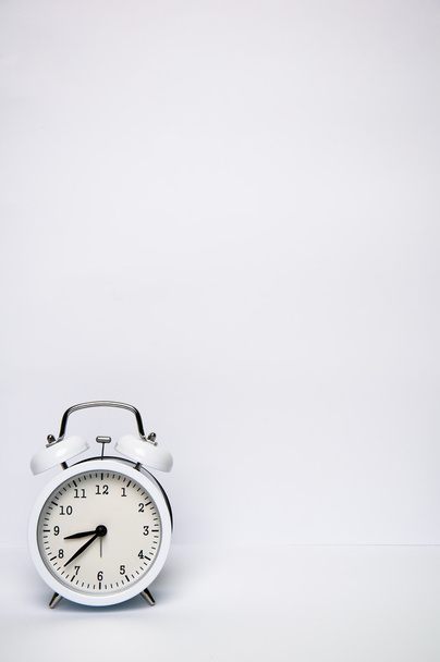 White alarm clock isolated on white background - Fotó, kép
