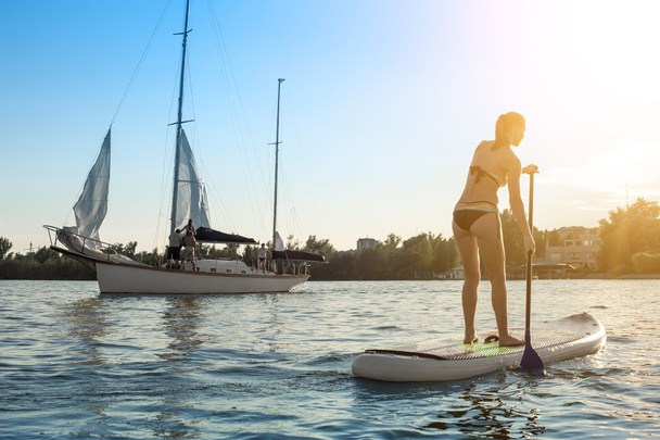 SUP Stand up paddle board woman paddle boarding13 - Photo, Image