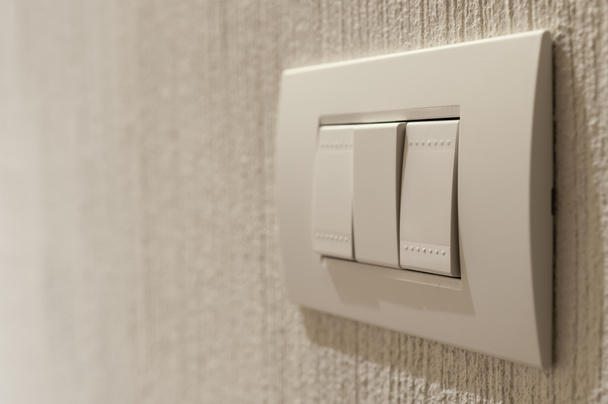 Closeup of  a lighting switch - Photo, image