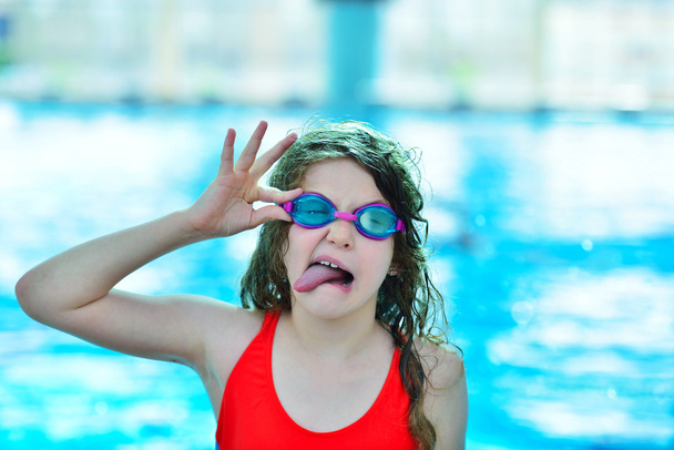 little girl posing in pool - Photo, Image