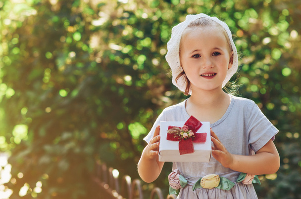 little girl with gift box - Photo, Image
