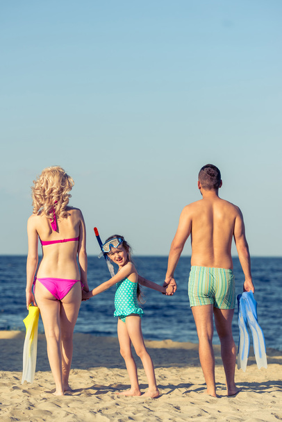 Family on the beach - Фото, зображення