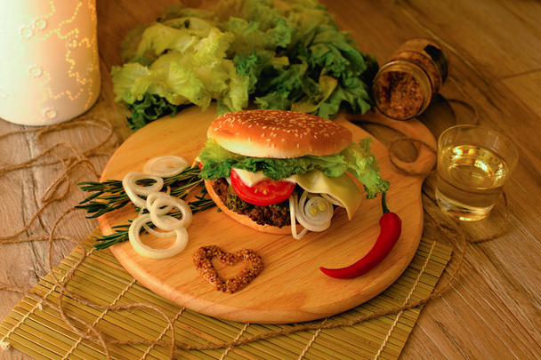 Homemade hamburger on the wooden desk - Фото, зображення