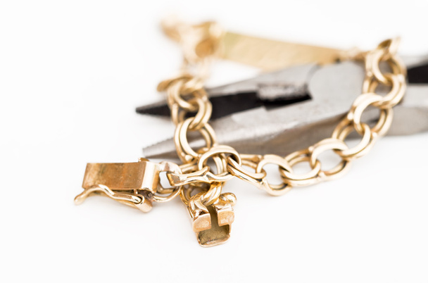 Detail van een gouden armband - Foto, afbeelding