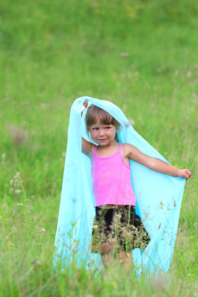A beautiful little girl on the nature - Фото, зображення