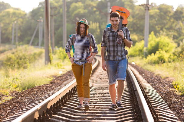 Two young Hikers walking along Railroad - Photo, Image