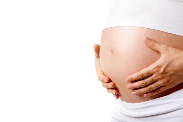 έγκυος γυναίκα σε λευκό φόντο - Φωτογραφία, εικόνα