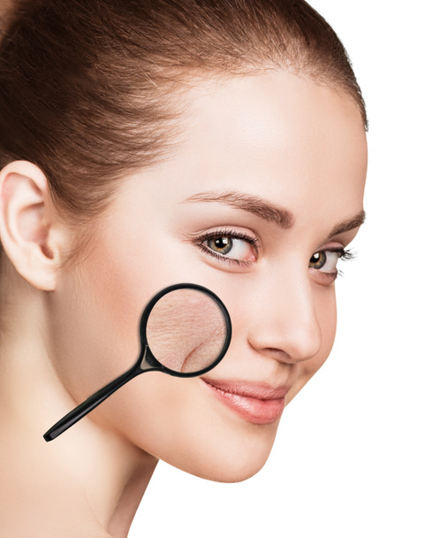 Eoman with magnifying glass showing aging skin - Photo, Image