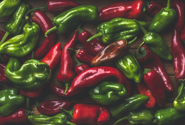 Pattern of small colorful hot chili peppers - Foto, afbeelding