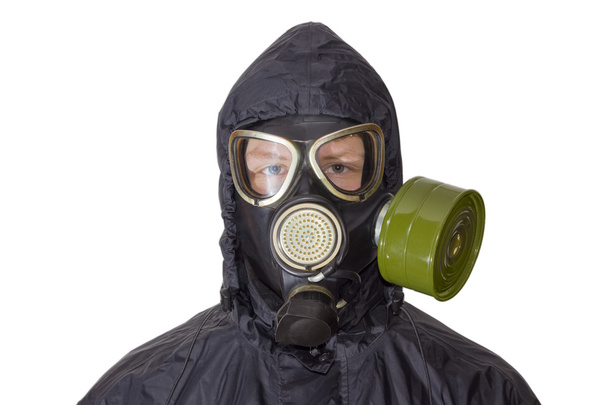 Persona con máscara de gas sobre un fondo claro
 - Foto, Imagen