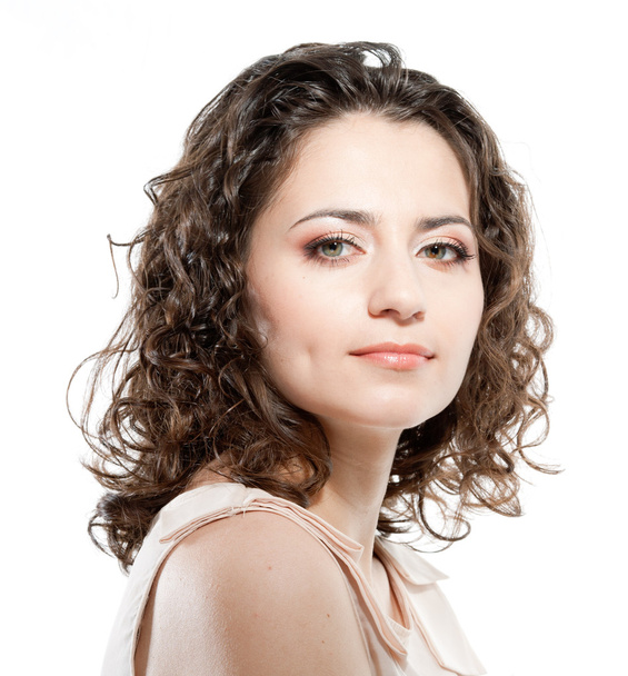 Beautiful brunette young girl with curly hair and bright makeup - Φωτογραφία, εικόνα