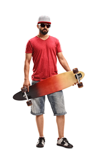 Man holding a longboard  - Foto, imagen