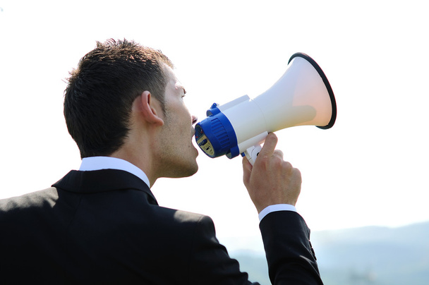 Business Man with loudspeaker - Photo, Image