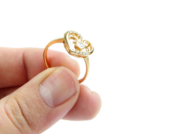 anillo en la mano
 - Foto, Imagen
