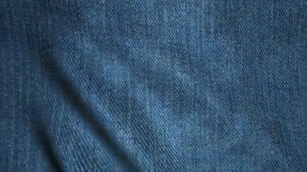 Realistic Ultra-HD jeans cloth waving in the wind. Seamless loop with highly detailed fabric texture - Footage, Video