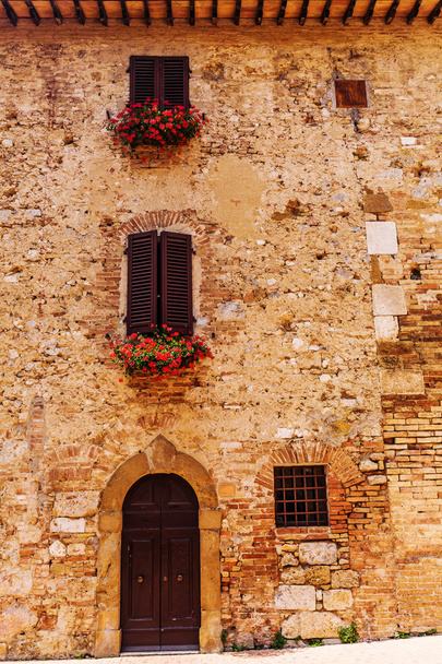 Fasáda domu v San Gimignano, Itálie - Fotografie, Obrázek