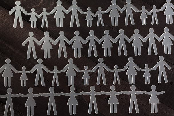 Menschenkette auf schwarz - Foto, Bild