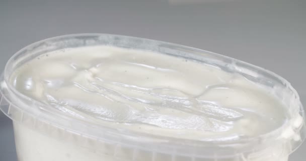 Close up of vanilla ice cream scooping - Filmati, video
