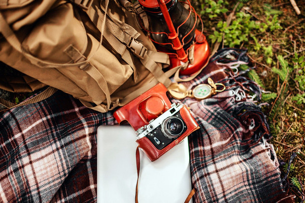 Travel set, blanket are vintage compass, camera, canteen and a flashlight - Photo, Image
