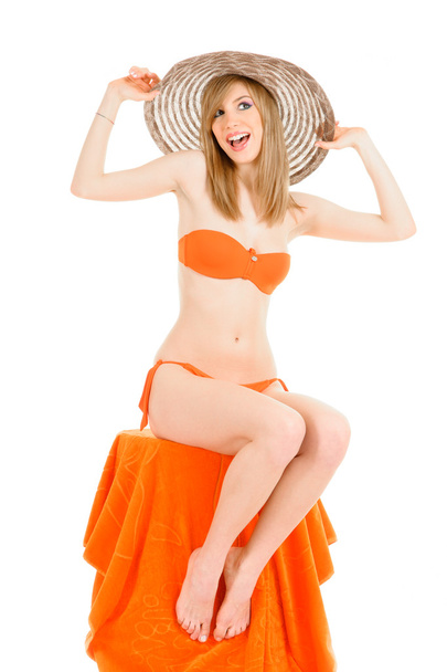 Young woman in orange bikini - Fotó, kép