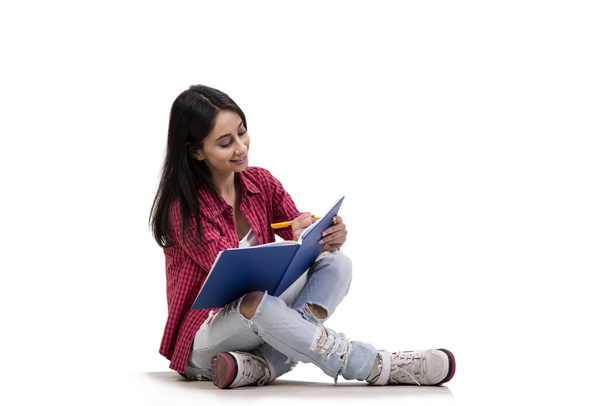 Young female student preparing for exams - Photo, Image