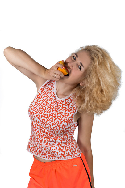 jovem mulher com laranja
 - Foto, Imagem