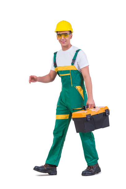 Νεαρός άνδρας με toolbox κιτ εργαλείων που απομονώνονται σε λευκό - Φωτογραφία, εικόνα