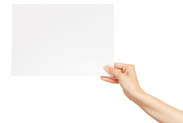 Paper card in woman hand isolated on white background - Foto, Bild