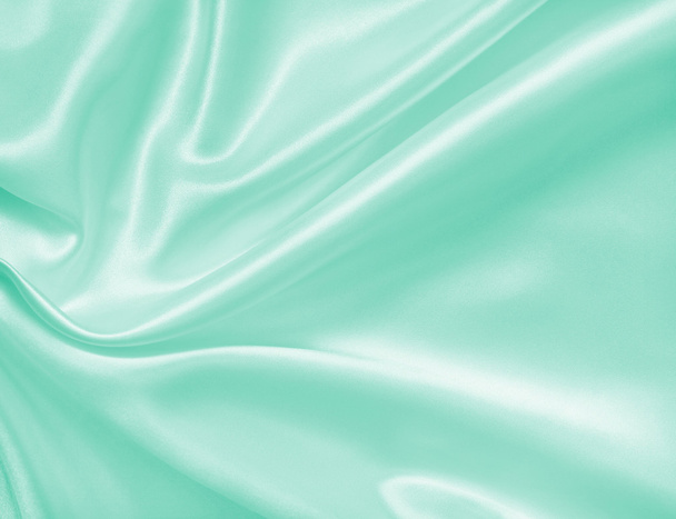 Smooth elegant green silk or satin texture as background  - Фото, зображення