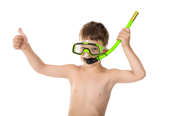 Smiling boy in diving mask with thumb up sign - Фото, изображение