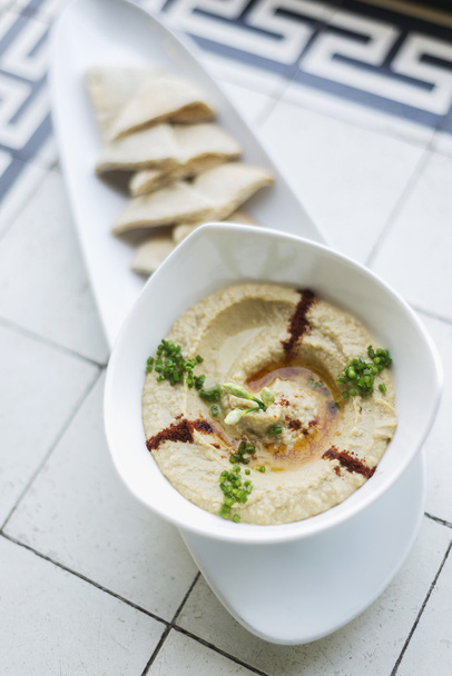 hummus houmous Médio Oriente vegetariano grão de bico mergulhar lanche alimentos
 - Foto, Imagem