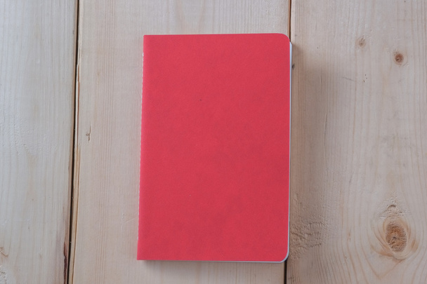 Recycled paper book on wooden background - Φωτογραφία, εικόνα