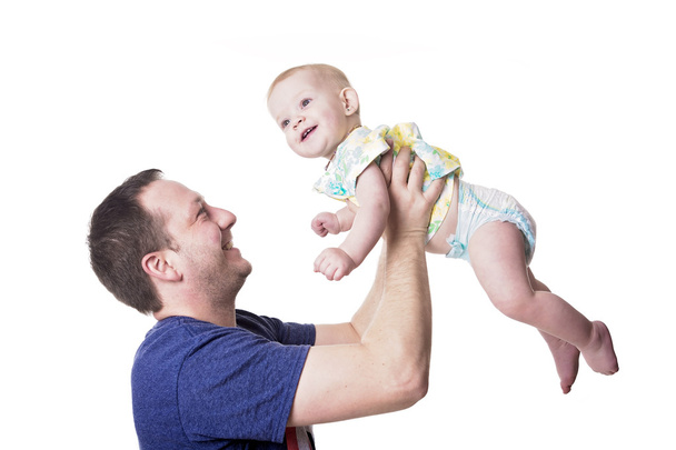Happy young father playing with little daughter - 写真・画像