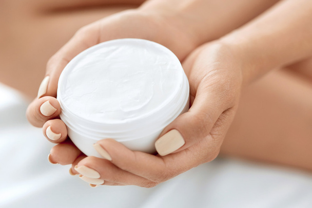 Skin Care Product. Woman's Hands Holding Beauty Cream, Lotion. - Фото, зображення