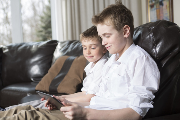 Children playing with tablet pc - Photo, Image