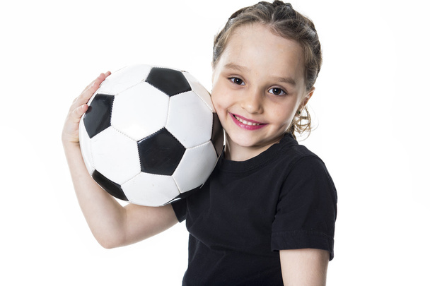 Chica joven jugar pelota de fútbol, Aislado sobre blanco
 - Foto, Imagen