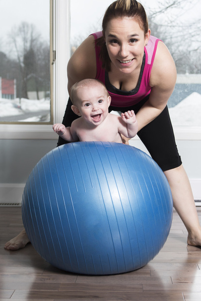 Mother with child boy doing fitness exercises - Valokuva, kuva