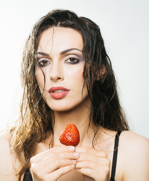 sexy pretty woman with red strawberry - Foto, Imagem