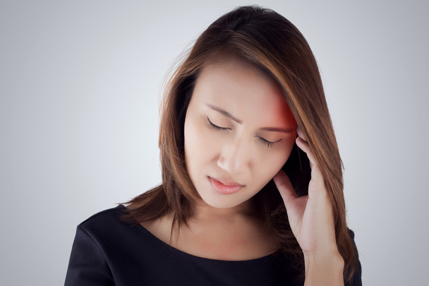 Πονοκέφαλο. Ασιατικές γυναίκα που έχει έναν πονοκέφαλο - Φωτογραφία, εικόνα