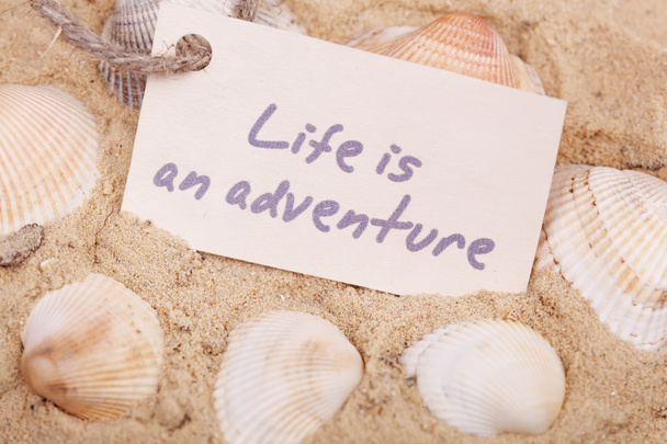 Message Life is an adventure on the sand - Foto, Bild
