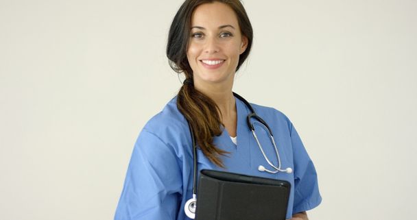 női orvos mosolyog kamera - Fotó, kép