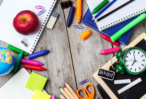 Assortment of office and school supplies on wooden table - Photo, Image