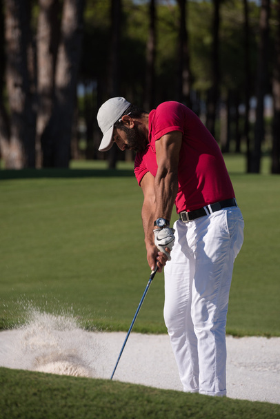 golfer hitting a sand bunker shot - Photo, image