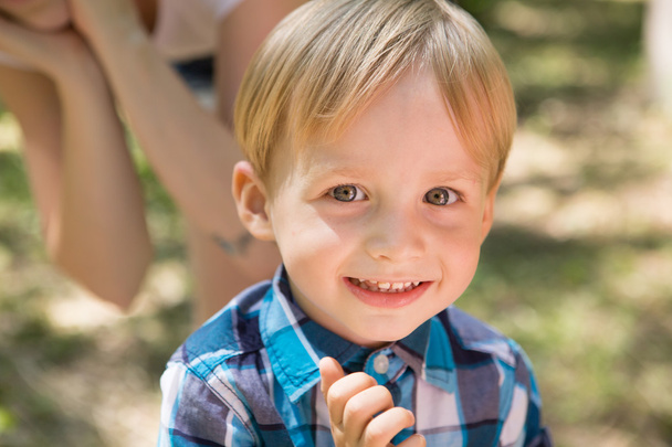Portrait of blonde little boy posing outside - Foto, imagen