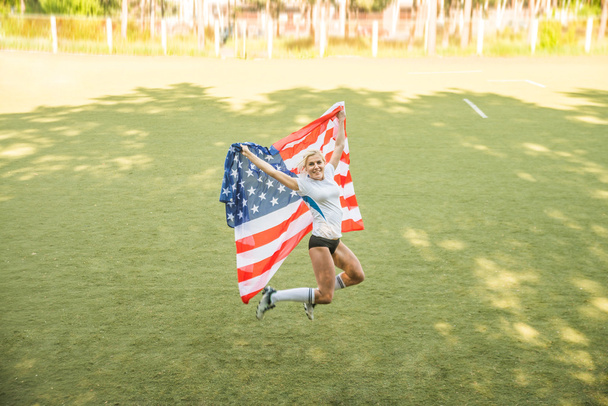 Woman holding American Flag  - Photo, image
