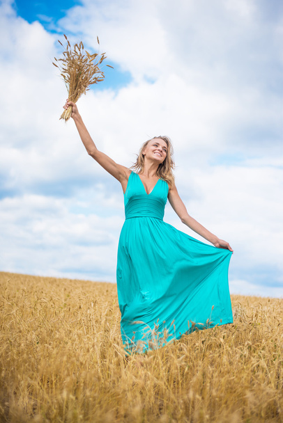 Portrait of romantic slim woman stand on wheat field wearing bri - Photo, Image
