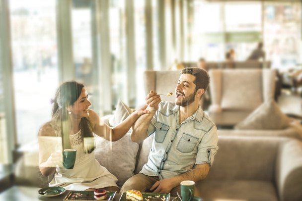 couple eating biscuits - Photo, Image