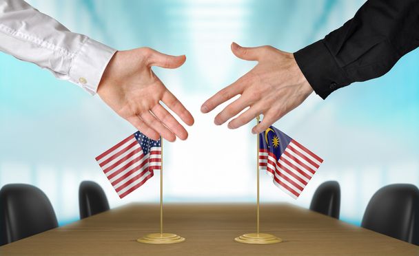 Stany Zjednoczone i Malezji dyplomatów drżenie rąk do uzgodnienia deal, część renderowania 3d - Zdjęcie, obraz